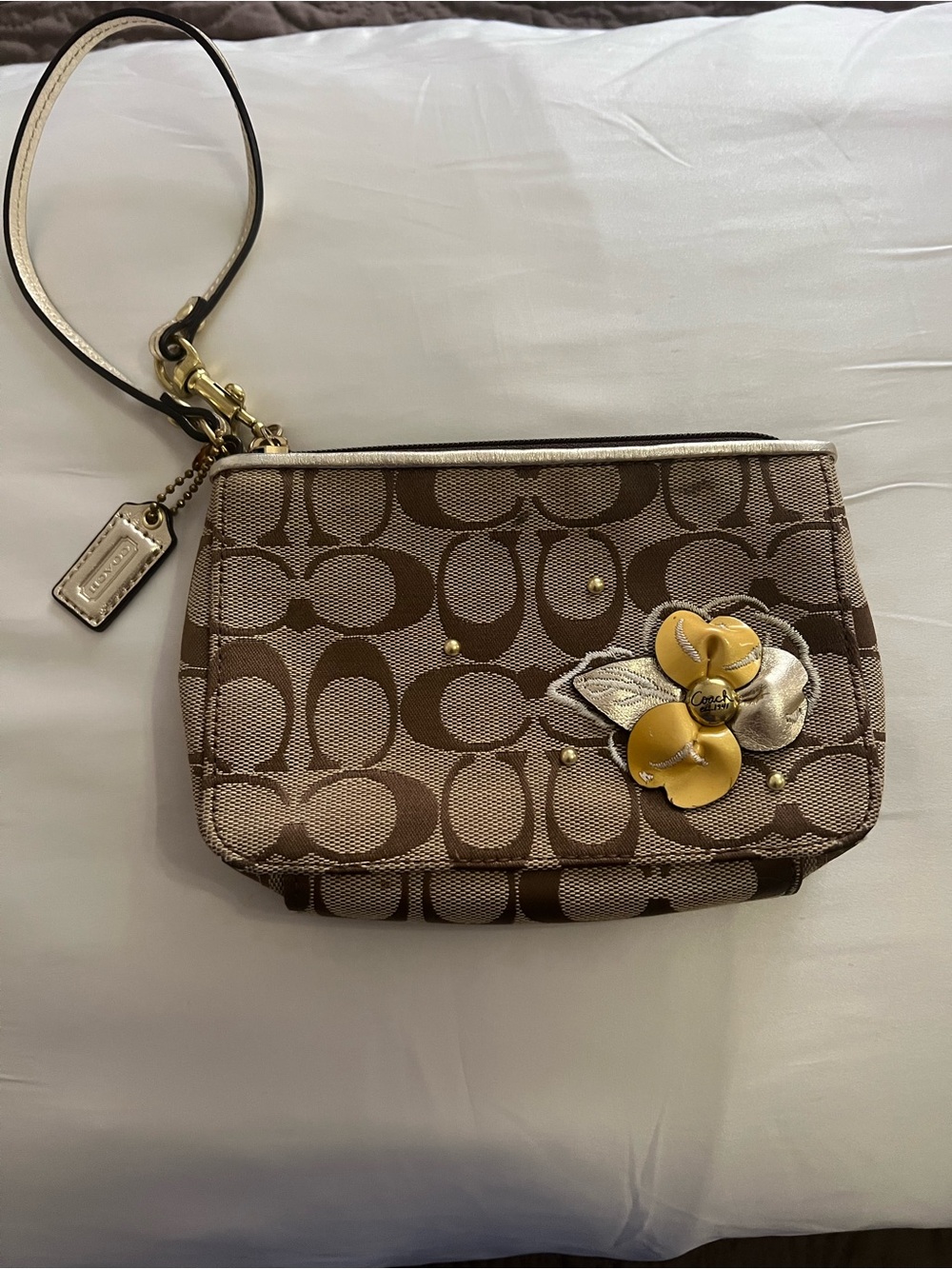 Coach Brown Signature Canvas Wristlet with Flower